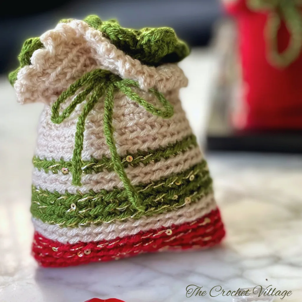 Crochet striped gift bag for Christmas.