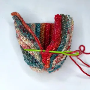 Sewing a crochet piece around a bobble ornament