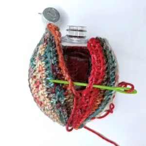 Sewing a crochet piece around a bobble ornament