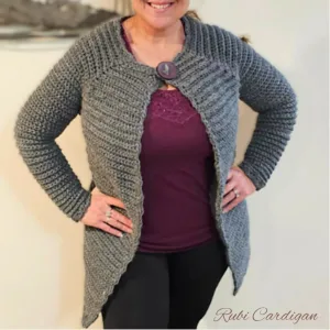 A women wearing a long cardigan attached at the top with a wooden button.