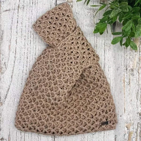 Crochet Japanese knot bag pattern flat lay showing textured one-row repeat stitch and unique knotted handle design - Coco Knot Bag