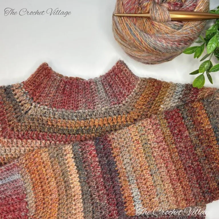 "Close-up of chestnut crochet stitch texture showing raglan sleeve construction detail