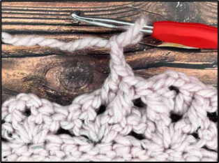 Beginning the Chestnut Blanket free crochet pattern showing the first rows of the textured waffle V-stitch design