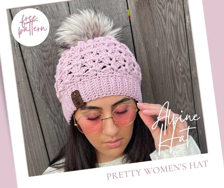 Woman wearing handmade Alpine bottom-up crochet ribbed hat in light pink - free beanie pattern