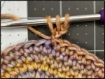 Progress photo showing how to crochet star stitch - step 1 of tutorial demonstration