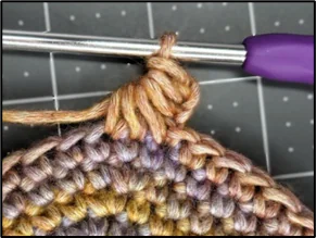 Step-by-step progress photo of the star stitch technique