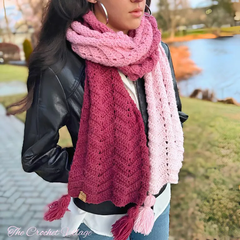 Girl wearing handmade Valentine's Day chevron ripple crochet scarf in pink