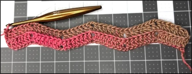 Close up of chevron ripple stitch crochet pattern Valentine's Day scarf