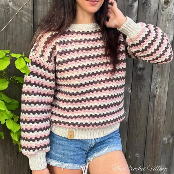 Woman styling the free Arcadia oversized crochet sweater—beginner-friendly pattern sizes XS to 5XL