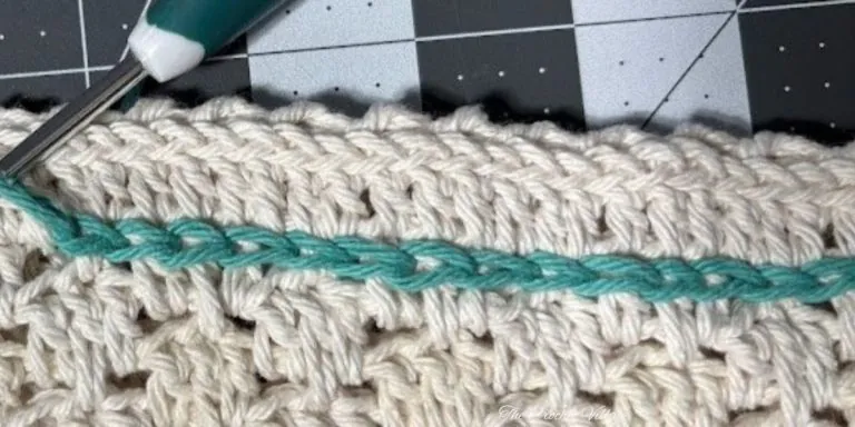 Close-up of crochet crossbody bag - round 28