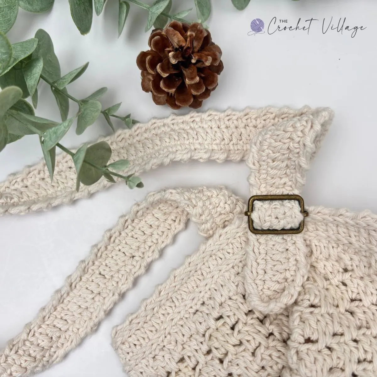 Woman carrying the Macchiato Bag, a stylish crochet crossbody bag made from the free crochet pattern.