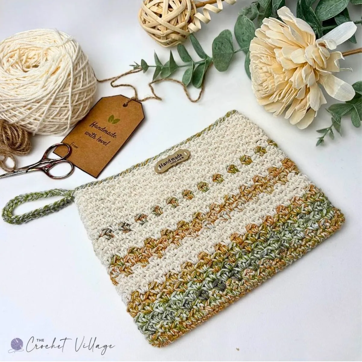 Milano free crochet clutch pattern — small beginner purse in variegated and solid worsted weight cotton yarn