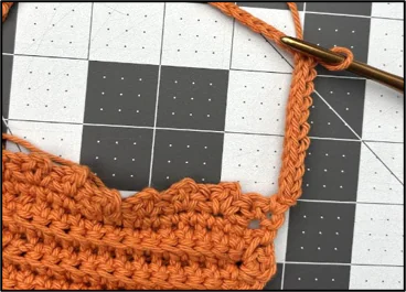 Finishing the handles of the crochet back scrubber, Papaya Spa Set free pattern.