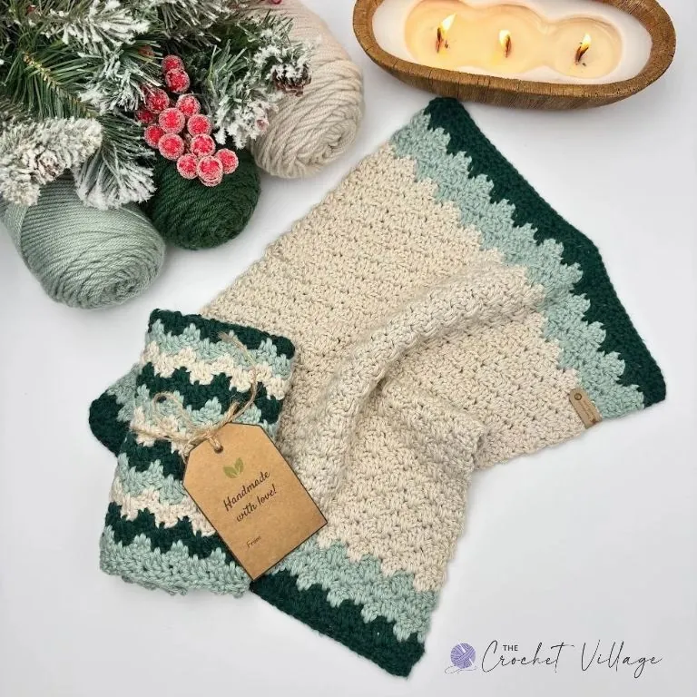 Crochet towel and washcloth set in green and cream, shown in plain and striped versions with a handmade gift tag